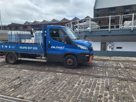 Oilfast truck delivering to marina