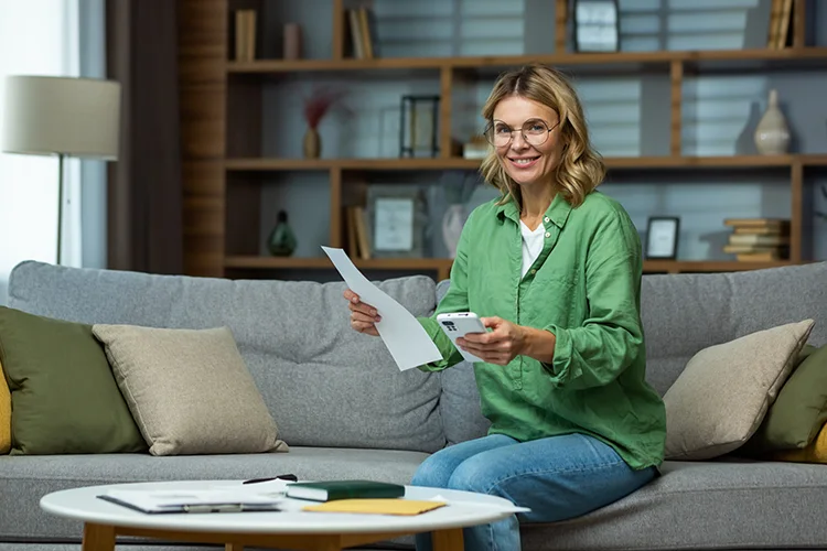 Woman organising heating oil bills